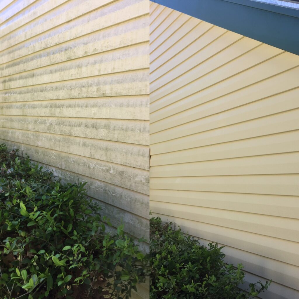 Side-by-side comparison of yellow vinyl siding before and after pressure washing, showing heavy dirt and mildew buildup removed to reveal a clean, bright surface.