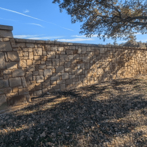 Stone wall cleaned with pressure washer - Luke's Pressure Washing